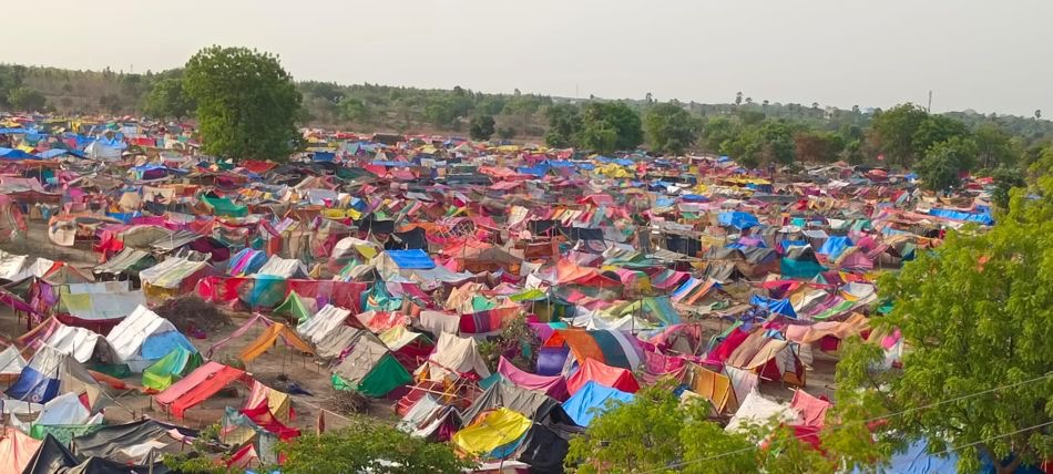 Some of the 10000 huts and tents on the occupied land 25 May 2022